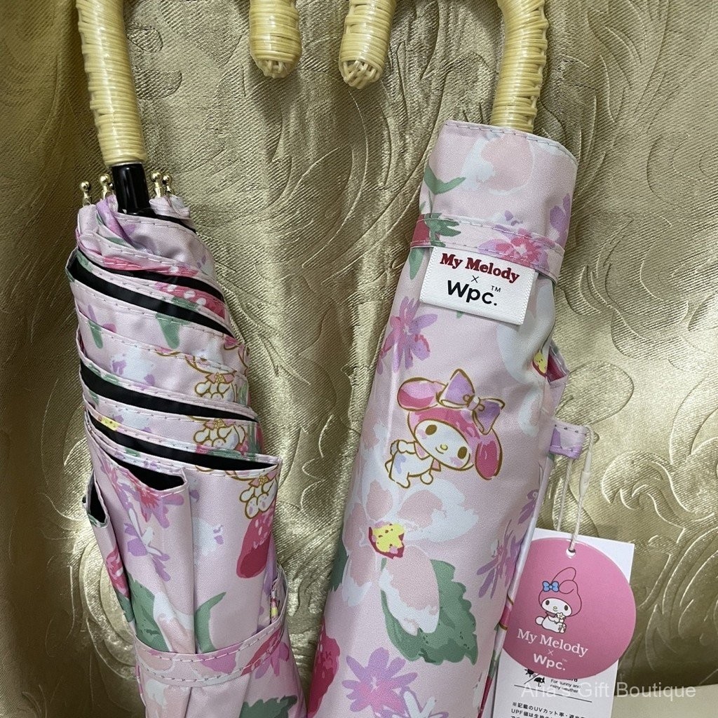 Ô che nắng Hello Kitty chính hãng, chất liệu vinyl siêu nhẹ, chắn nắng hiệu quả.
