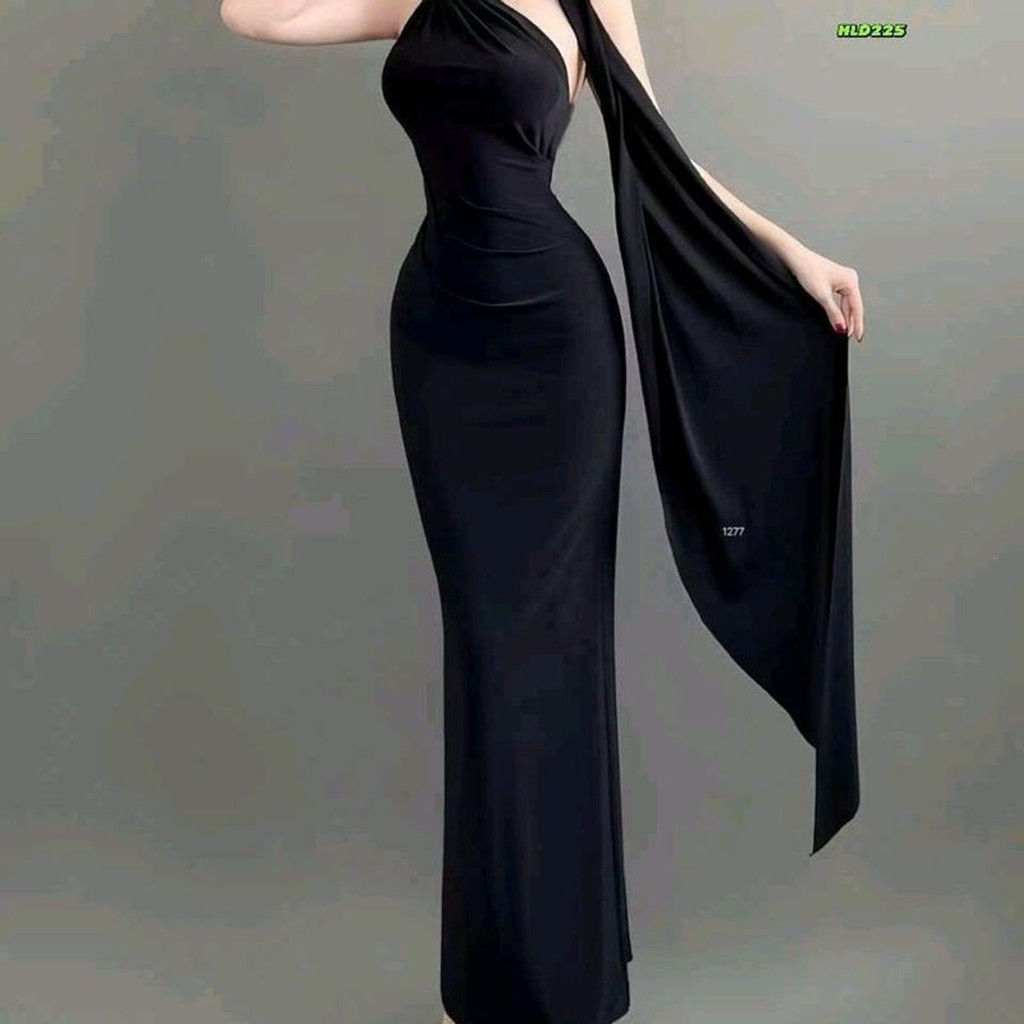 "Đầm body dài hở lưng dây quấn cổ thanh lịch, chất thun là đồng co giãn, hoàn hảo cho tiệc và dạo phố."