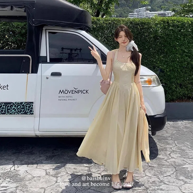 Đầm Nữ Pháp Sling Nhẹ Nhàng Vàng Đi Biển Ngày Lễ Tính Khí Mới Eo Ôm Dài