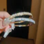 Vòng tay bốn lá cỏ ba lá màu vàng full pave cubic zircon, phong cách thanh lịch phương Tây