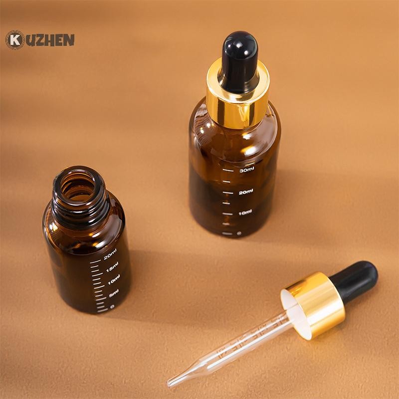 Kuzhen 5ml-100ml Chai nhỏ giọt có quy mô Thuốc thử Giọt mắt Kính màu hổ phách Chai pipet lỏng Chai có thể đổ lại Du lịch HOT