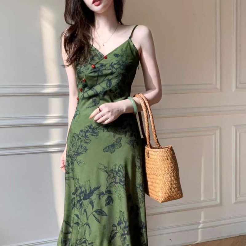 Mùa hè đầm over-the-knee không tay màu xanh đậm, thiết kế sang trọng với ánh sáng
