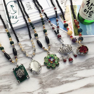 Ghgl❤️Hàng sẵn có Vòng cổ cao Opal thời trang cổ điển Nữ phong cách dân tộc Phong cách dài khí chất Áo len Dây chuyền hoa kim cương All-