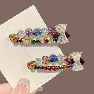 Kẹp tóc thiết kế sang trọng với nơ mỏ vịt đầy kim cương, xu hướng mới nhất 2025