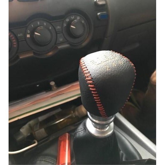 Bao da bọc cần số - phanh tay các đời xe Ford Ranger, BT50 số sàn(MT) da bò handmade khâu thủ công