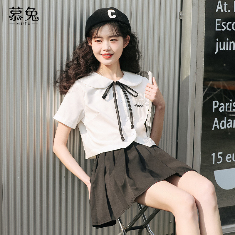 Mutu jk Đồng Phục Quần Áo Nữ Mùa Hè 2026 Phong Cách Mới Cổ Búp Bê Top