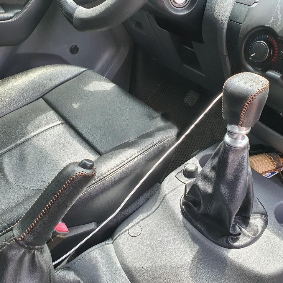 Bao da bọc cần số - phanh tay các đời xe Ford Ranger, BT50 số sàn(MT) da bò handmade khâu thủ công
