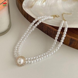 Bộ trang sức cô dâu ngọc trai gồm bông tai và vòng cổ dành cho đám cưới