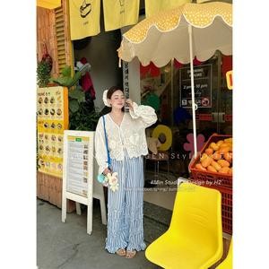 Set áo thô boil buộc nơ trước ngực phối cùng quần ống rộng kẻ sọc nhún bèo cá tính năng động xinh đẹp - Baotrang.clothes
