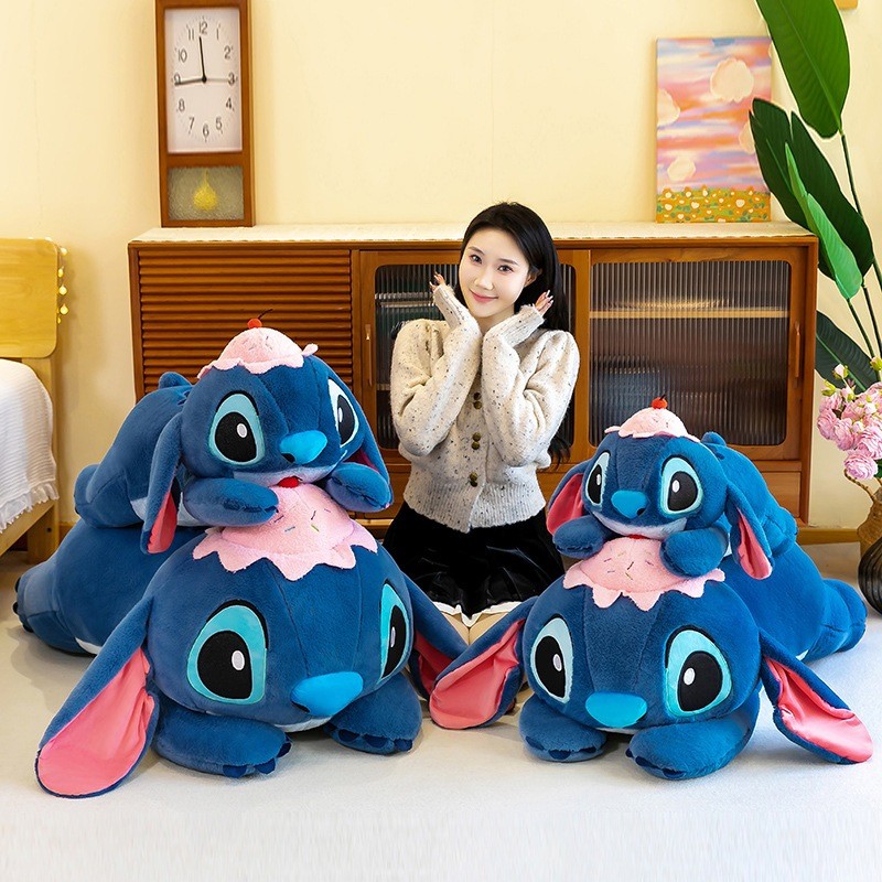 Gấu Bông Ôm Ngủ Stitch Dáng Nằm Dùng Để Ôm Gác Chân Dựa Lưng Gấu Nằm Stick Đội Mũ Bánh Chất Liệu An Toàn Thân Thiện