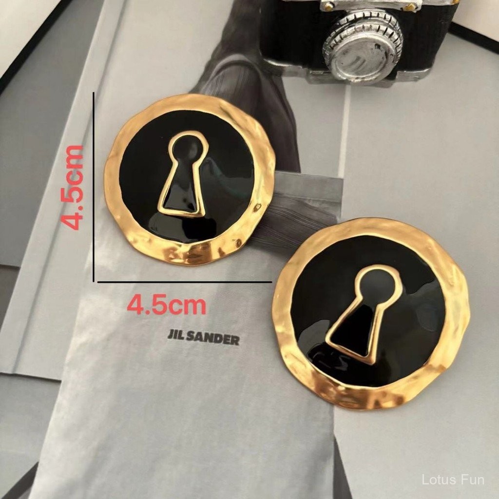 Shaparelli Pháp cao cấp cảm giác men lớn bông tai cường điệu cá tính khóa hình dạng thanh lịch tai