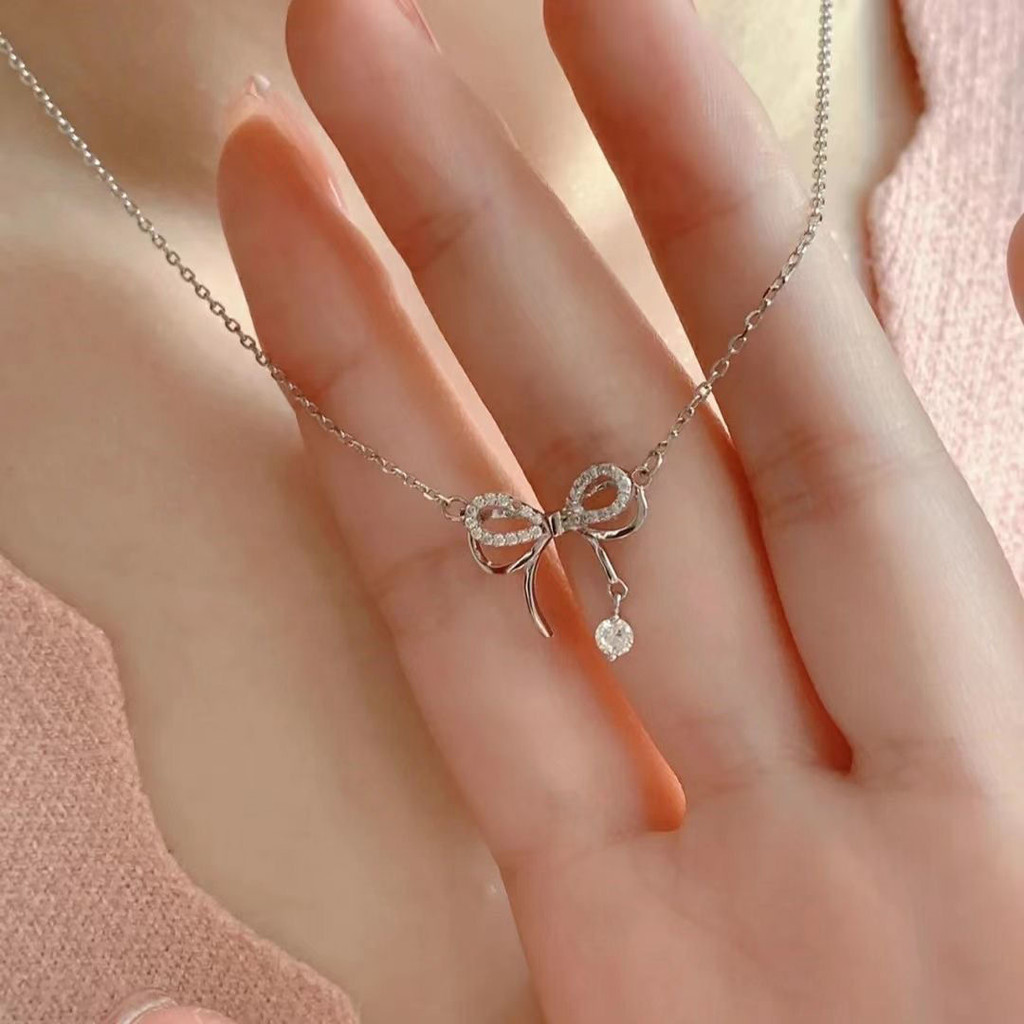 Vòng cổ nơ hai lớp tua rua thả nước cho nữ