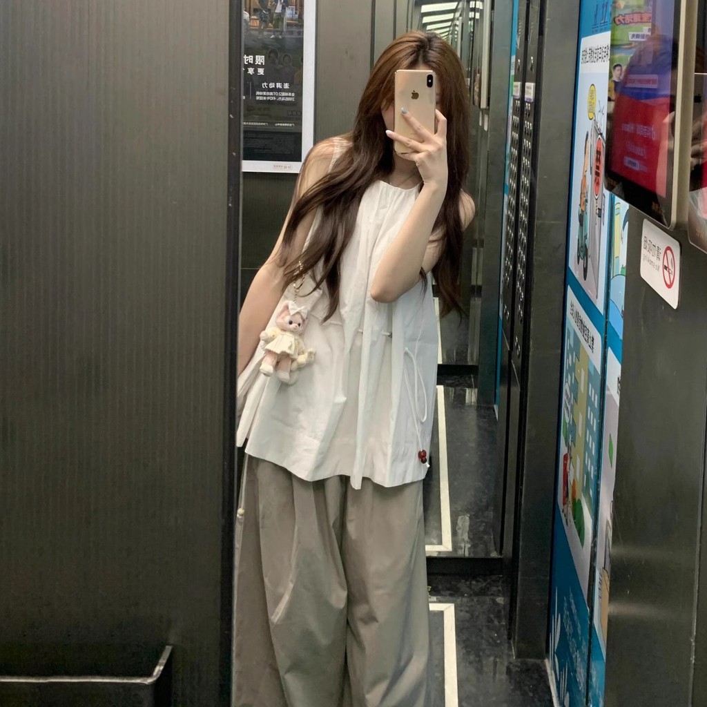 [Yu]Áo sơ mi trắng không tay dây rút, phong cách thường ngày, phối quần ống rộng cao.
