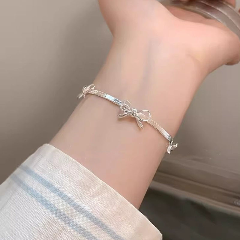 Vòng tay xương rắn nơ bạc đơn giản - phụ kiện trang sức tay cao cấp