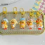 Bighsm Upsetduck Vịt Vàng Búp Bê Nhựa Móc Khóa Mặt Dây Chuyền Móc Khóa Cho Bé Gái Ba Lô Charm Tai Nghe Phụ Kiện Túi Đôi Quà Tặng Martijn