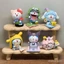 Crossdressing hộp mù Doraemon Búp bê đồ chơi viên nang làm bằng tay pokonyan quà sinh nhật nữ dễ thương trang trí để bàn