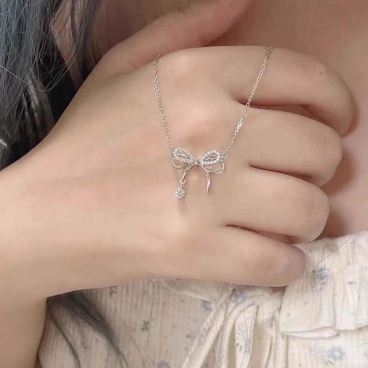 Vòng cổ nơ hai lớp tua rua thả nước cho nữ