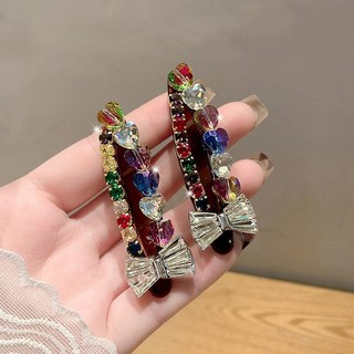 Kẹp tóc thiết kế sang trọng với nơ mỏ vịt đầy kim cương, xu hướng mới nhất 2025