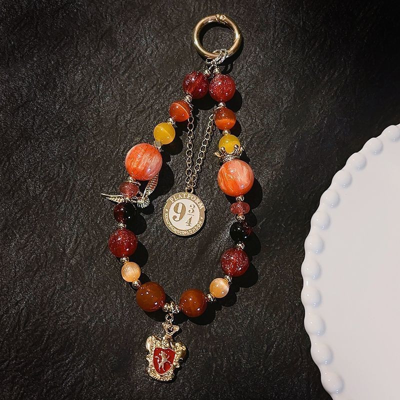 Bán Sản phẩm mới Harry Derivative Potter Đồ trang trí Slytherin Dây chuyền điện thoại di động Snake Court Gran Fendor Ravenclaw Túi đồ trang trí chất lượng cao