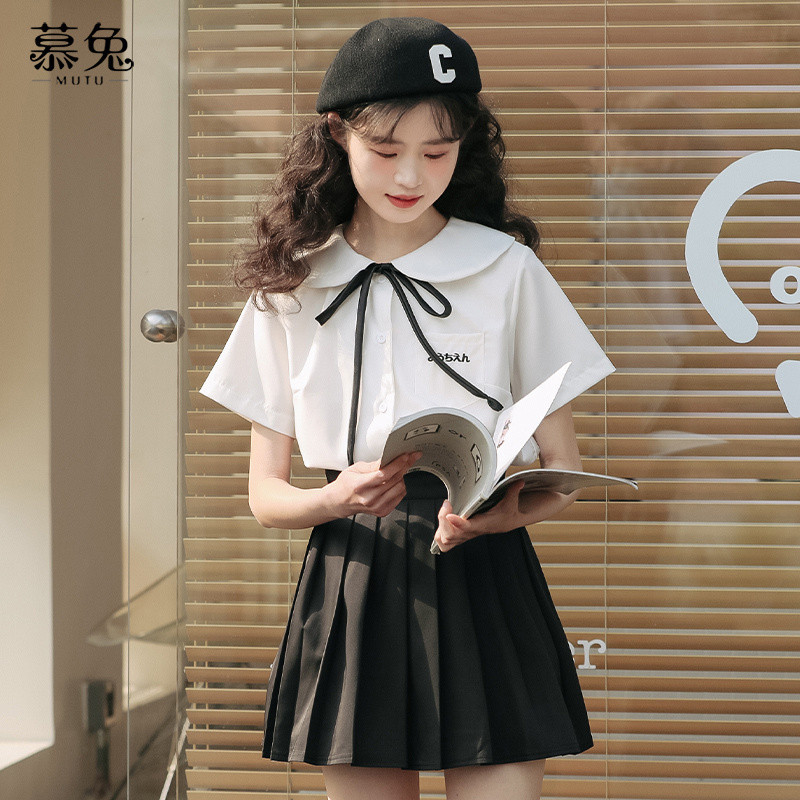 Mutu jk Đồng Phục Quần Áo Nữ Mùa Hè 2026 Phong Cách Mới Cổ Búp Bê Top