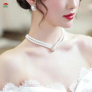 Bộ trang sức cô dâu ngọc trai gồm bông tai và vòng cổ dành cho đám cưới