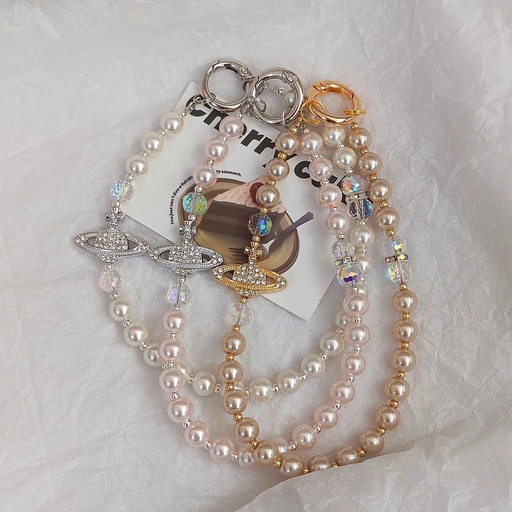 [3676 Bộ sưu tập người] Ánh sáng sang trọng cao cấp nhấp nháy kim cương Saturn Pearl Dây chuyền điện thoại di động diy Đính cườm cổ tay ngắn Dây chuyền túi Niche tinh tế Mặt dây chuyền