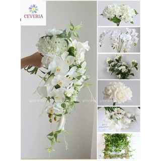 Bó hoa cưới cầm tay cô dâu dáng thác đổ phong cách phối hoa lan trắng kiêu sa  CEVERIA
