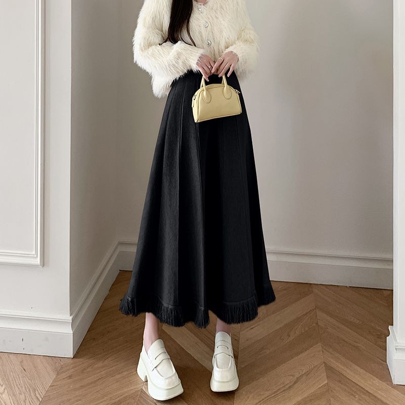 Giữa Đến Dài Thu Đông Tính Khí Dệt Kim Rời Chữ A Váy Có Sợi Nữ Plus Size Tua Rua Cao Cấp Nửa Chiều Dài Váy