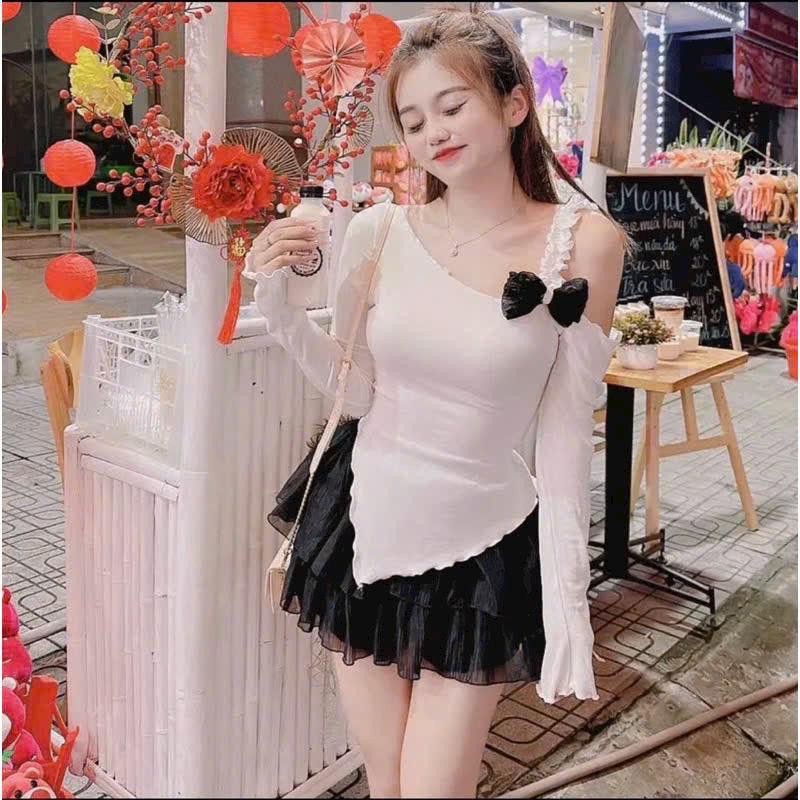 Áo thun đính nơ dây một bên vai , vạt xéo Nữ Top