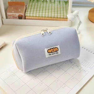 Đơn giản vải nhung hoạt hình nhỏ Hộp đựng bút chì bánh mì Macaron Niche Túi văn phòng phẩm sinh viên có giá trị cao có lớp xen kẽ