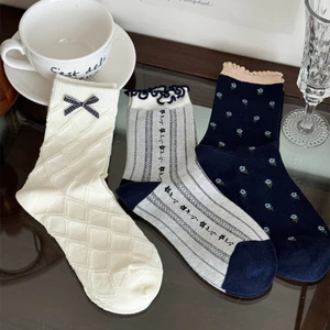 Tất nơ trắng bé gái ống giữa mùa thu đông tất dài cotton nguyên chất ins hợp thời trang dễ thương phong cách Nhật Bản mùa xuân thu tất đống