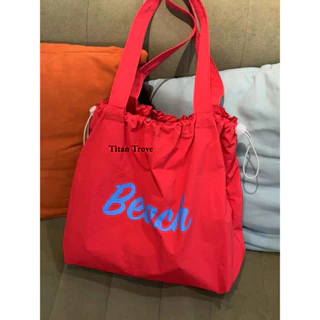 Titan Trove Phiên bản Hàn Quốc lười biếng bảng chữ cái túi vải mới đeo vai thông thường sức chứa lớn sinh viên dây rút đi lại túi tote