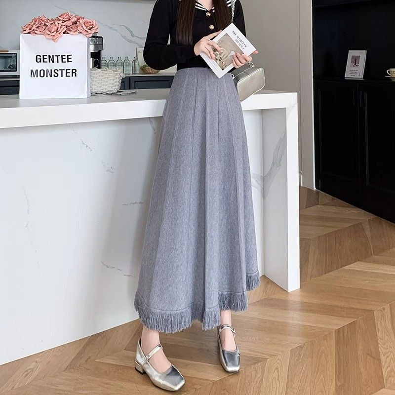 Giữa Đến Dài Thu Đông Tính Khí Dệt Kim Rời Chữ A Váy Có Sợi Nữ Plus Size Tua Rua Cao Cấp Nửa Chiều Dài Váy