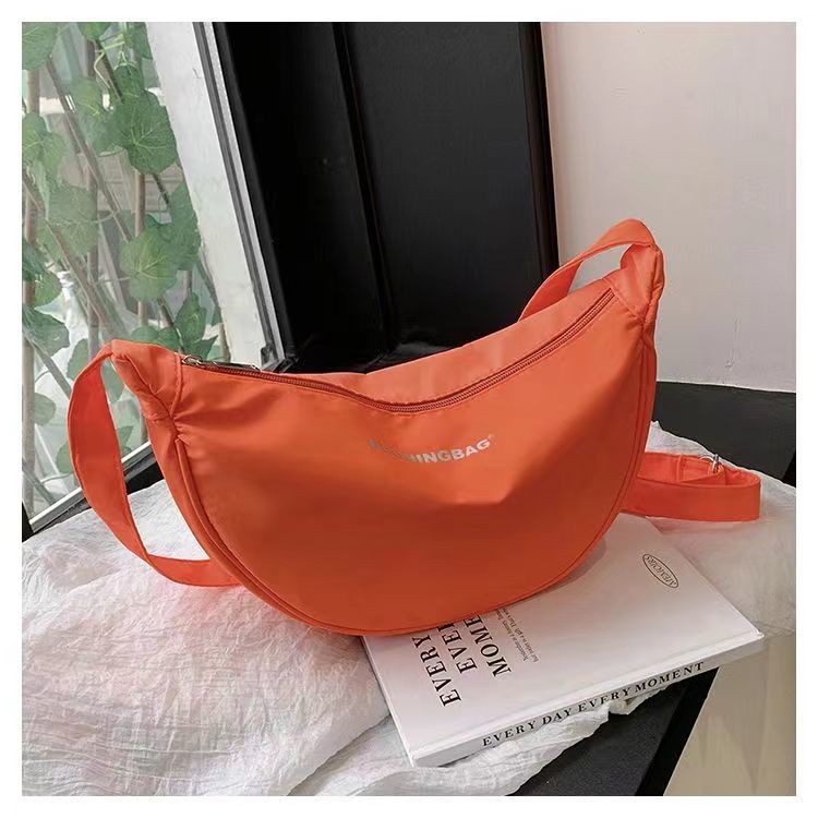 Túi đeo chéo nữ mùa hè đa năng bằng vải nylon mới, túi bánh bao cho học sinh, túi đeo chéo thoải mái