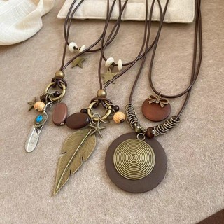Vòng cổ bohemian retro hợp kim và lông vũ, dễ dàng phối đồ