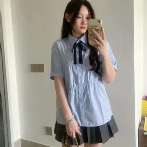 Áo babydoll xếp ly màu xanh tay ngắn đính nơ kiểu ulzzang thời trang hàn quốc