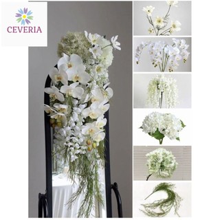 Bó hoa cưới cầm tay cô dâu dáng thác đổ phong cách phối hoa lan trắng kiêu sa  CEVERIA