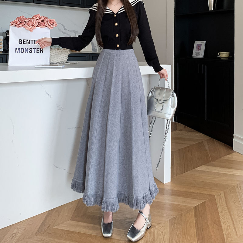 Giữa Đến Dài Thu Đông Tính Khí Dệt Kim Rời Chữ A Váy Có Sợi Nữ Plus Size Tua Rua Cao Cấp Nửa Chiều Dài Váy