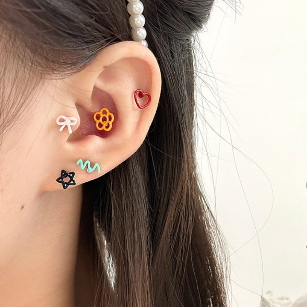 Bông tai nơ hình trái tim hoa rỗng bằng thép titan thông thường dành ...