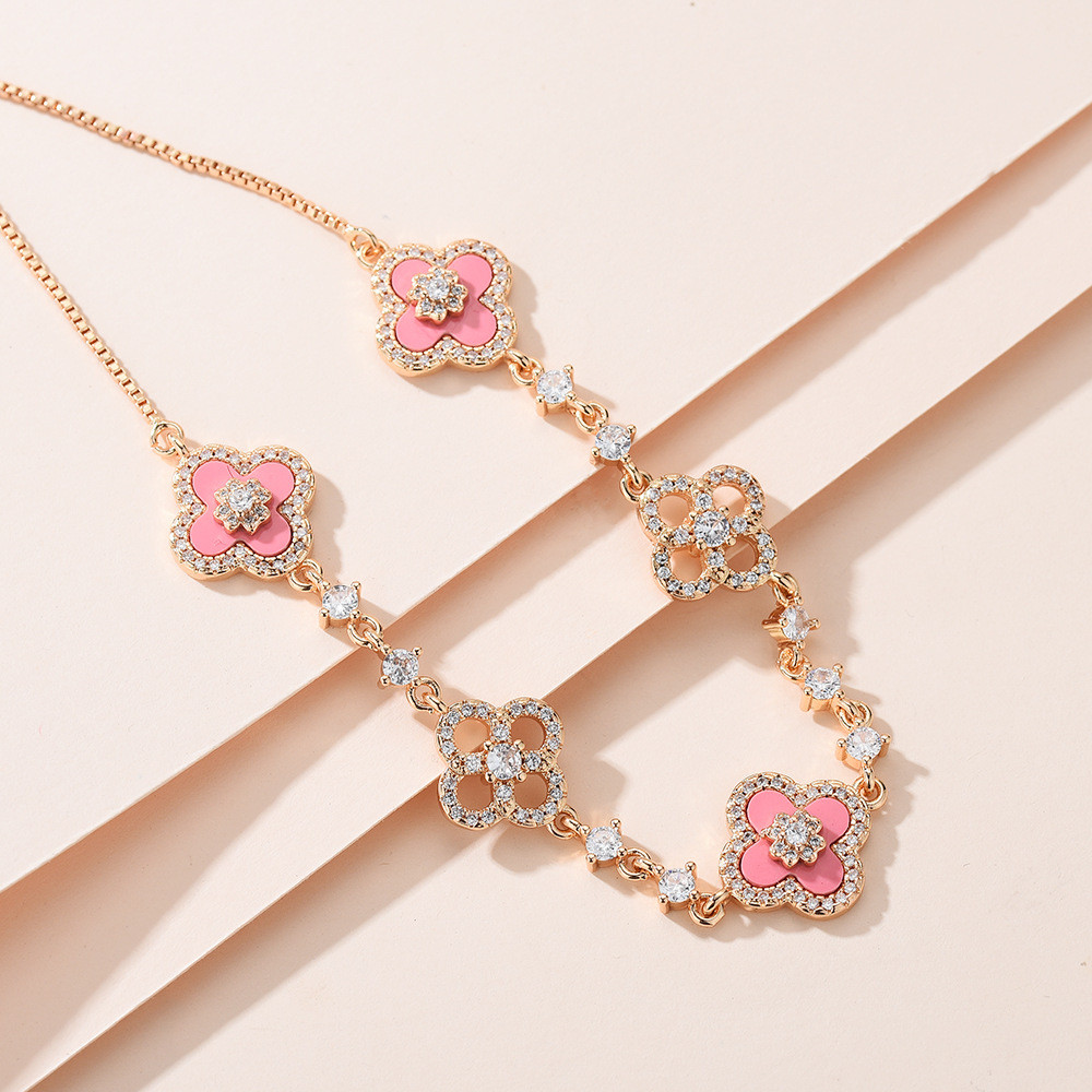 Phiên bản cao mạ vàng thật bốn cánh hoa Zircon May Mắn Cỏ Bốn Lá Hoa Sâm panh Vàng tính khí Vòng tay có thể điều chỉnh EK2S