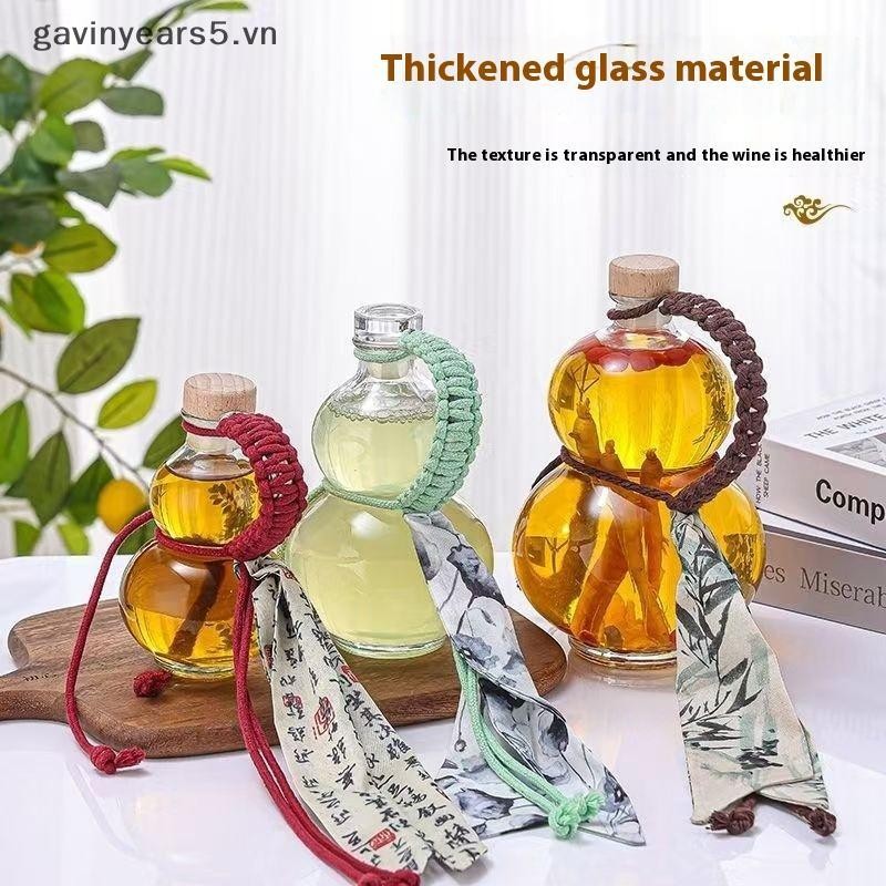 # gavin # Chai rượu thủy tinh Borosilicate cao hình bầu trong suốt Chai rượu thủy tinh chịu nhiệt Chai rỗng có nắp Chai trà sữa Chai pha lạnh.