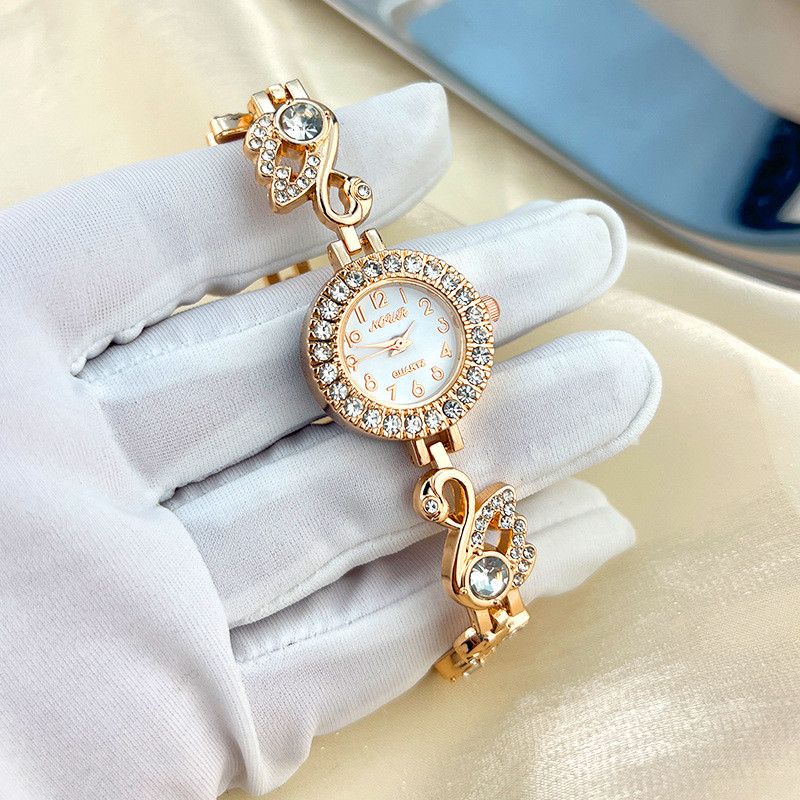 Đồng hồ nữ Bộ kim cương Swan Swarovski Vòng tay Đồng hồ đeo tay nữ Mặt số nhỏ Đồng hồ thạch anh đơn giản