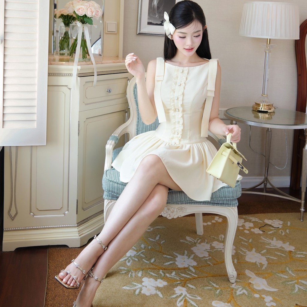 Đầm xòe Khiết Fashion tone vàng pastel ngọt ngào phối nơ bèo nhúng xinh xắn, phong cách nữ tính KD197