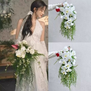 Bó hoa cưới thác đổ kiểu Hàn Quốc từ hoa lan và cỏ xanh