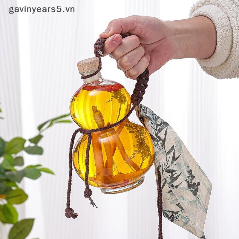 # gavin # Chai rượu thủy tinh Borosilicate cao hình bầu trong suốt Chai rượu thủy tinh chịu nhiệt Chai rỗng có nắp Chai trà sữa Chai pha lạnh.
