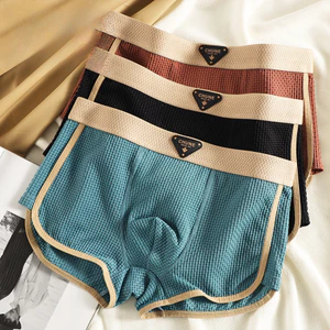 Phong Cách Mới Ice Silk Nam Quần Lót Thoải Mái Màu Trơn Bán Buôn Giữa Eo Nam Size Lớn Thoáng Khí Thanh Niên Boxer B6452