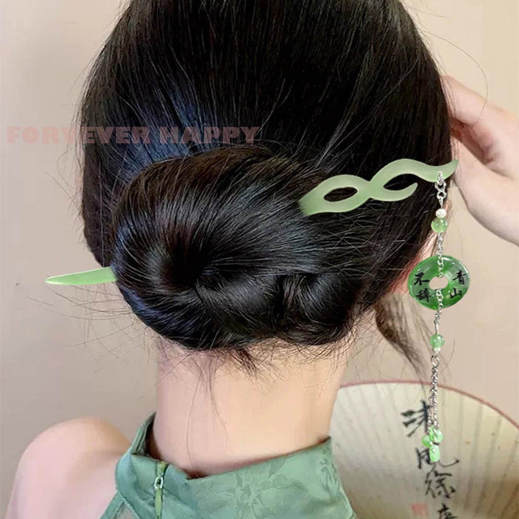 Chignon tóc phong cách Trung Quốc mới với thiết lập tua rua với trang trí tua rua bánh rán ngọc bích