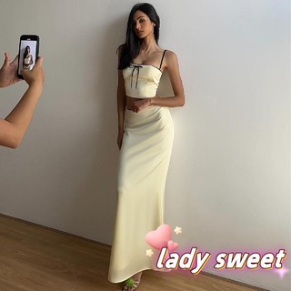 Cami phía trước nơ nữ với bộ váy dài tầng thấp