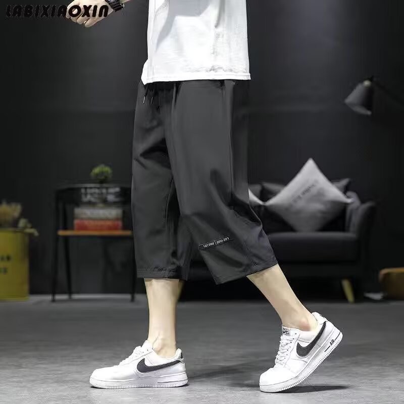 Quần short nam mùa hè nhẹ dáng rộng vừa vặn phong cách thể thao khô nhanh