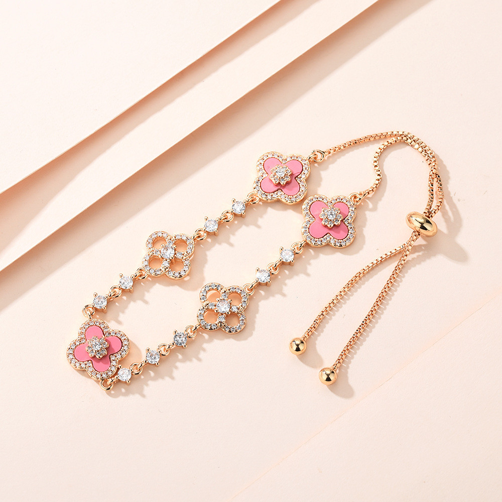 Phiên bản cao mạ vàng thật bốn cánh hoa Zircon May Mắn Cỏ Bốn Lá Hoa Sâm panh Vàng tính khí Vòng tay có thể điều chỉnh EK2S